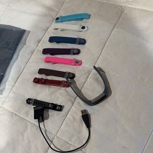 Pre-loved Colorful Fitness Tracker Bands with Charger and new bands